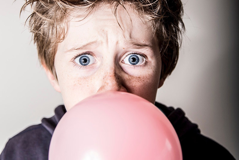 Little Boy Blowing Bubble Gum